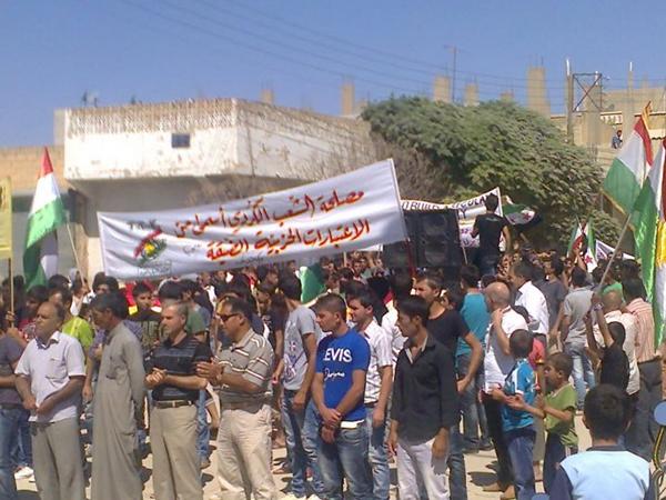 A banner at protest in the Kurdish Kobani reads, "The interest of the Kurdish people is superior to narrow partisan considerations", expressing the desperation over the conflicts between Kurdish parties.